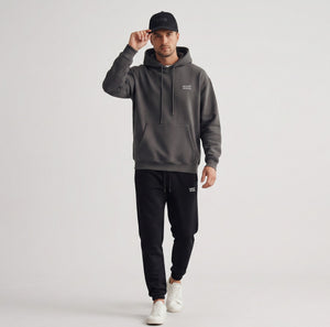 White London Clothing black cotton twill baseball cap with tonal embroidered patch and pre-curved brim.