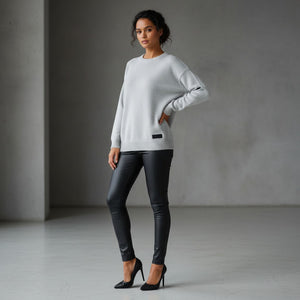 White London Clothing light grey oversized merino wool blend knitted sweater with textured boucle yarn and embossed logo tag.