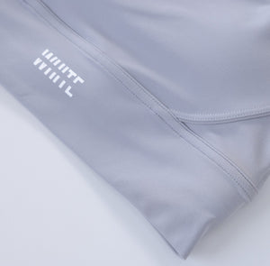 White London Clothing light grey sculpt sports bra with spaghetti straps and removable padding.