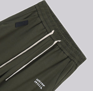 White London Clothing olive green relaxed fit trousers with drawstring and logo detail.