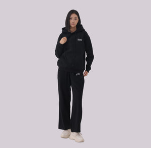 White London Clothing black 100% cotton hoodie with printed logo on chest and back, paired with matching sweatpants.