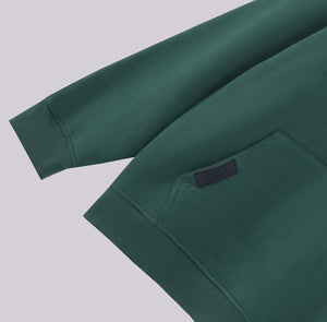 White London Clothing dark green 100% cotton hoodie with embossed logo tag on pocket and ribbed cuffs.