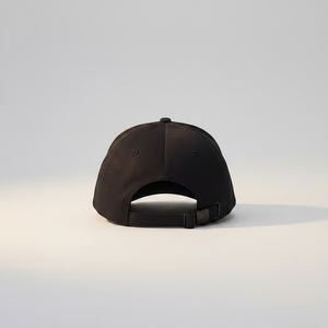 White London Clothing black cotton twill baseball cap with adjustable strap and six-panel design.