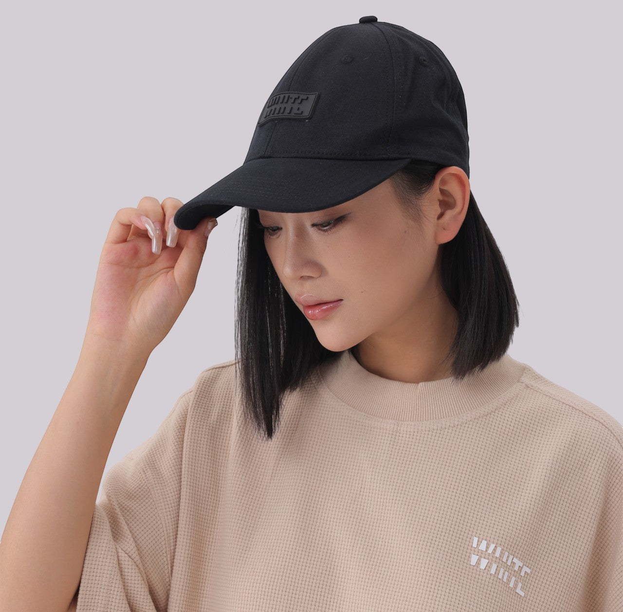White London Clothing unisex black cotton twill baseball cap with tonal embroidered patch and pre-curved brim.