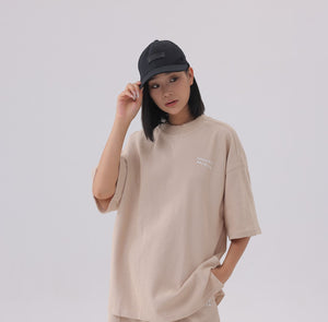 White London Clothing black cotton twill baseball cap with tonal embroidered patch and pre-curved brim.