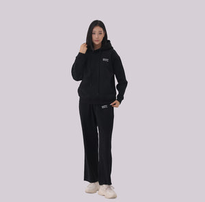 White London Clothing black 100% cotton hoodie with logo on chest and back, paired with matching sweatpants.