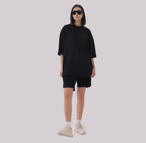 White London Clothing black heavyweight jersey cotton shorts with elasticated waistband and subtle logo accent on left leg.