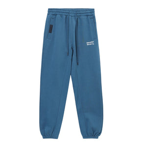 White London Clothing blue cotton jersey joggers with white logo on left thigh and embossed tag on pocket.