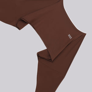 White London Clothing brown cotton jersey joggers with cropped length and white logo detail on left leg.