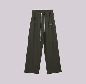 White London Clothing dark green relaxed fit trousers with drawstring and embroidered logo detail.