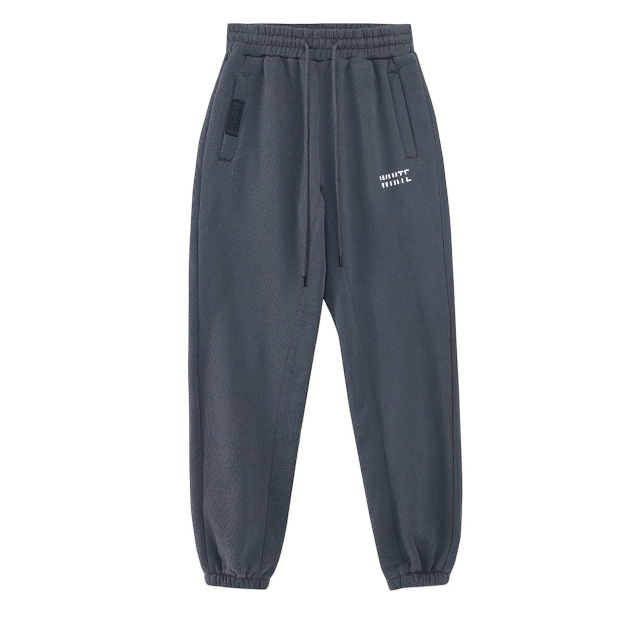 White London Clothing dark grey cotton jersey joggers with signature silhouette, cropped length, and white logo print on left thigh.