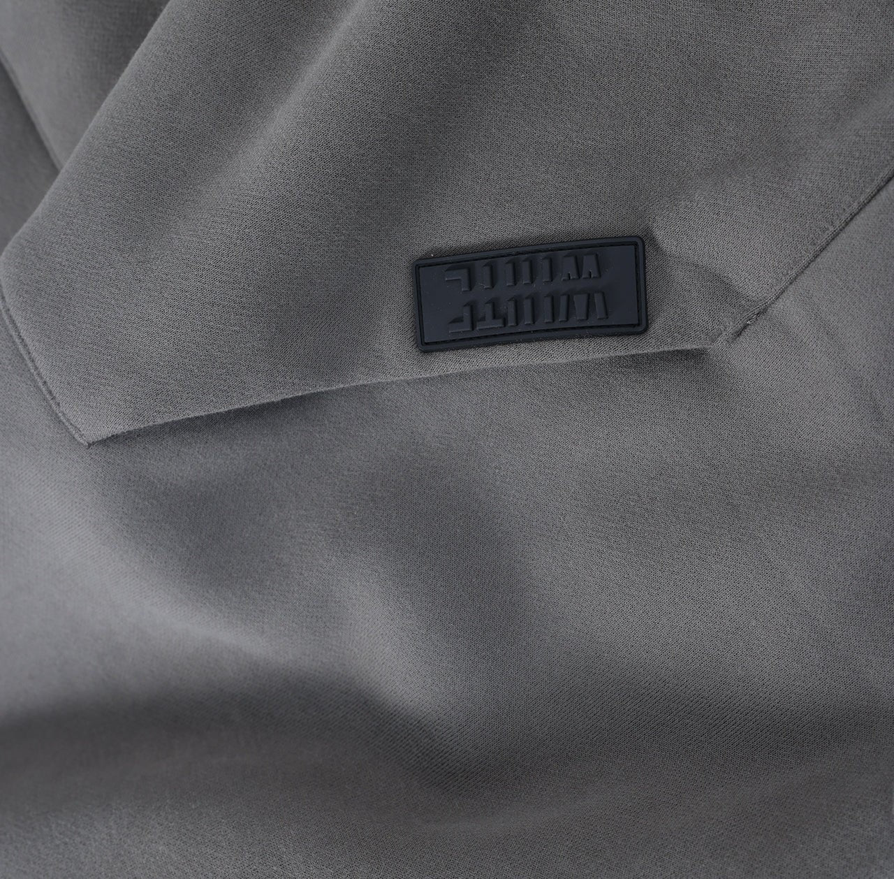 White London Clothing charcoal grey 100% cotton Dopamine Hoodie with embossed logo tag on pocket.