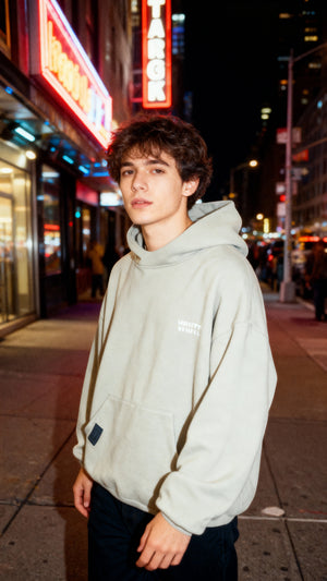 White London Clothing light grey 100% cotton Dopamine Hoodie with chest and back logo print. Model is 6'1" wearing a medium.