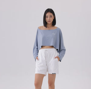 White London Clothing dusty blue oversized fit long sleeve cropped sweatshirt with white logo detail.