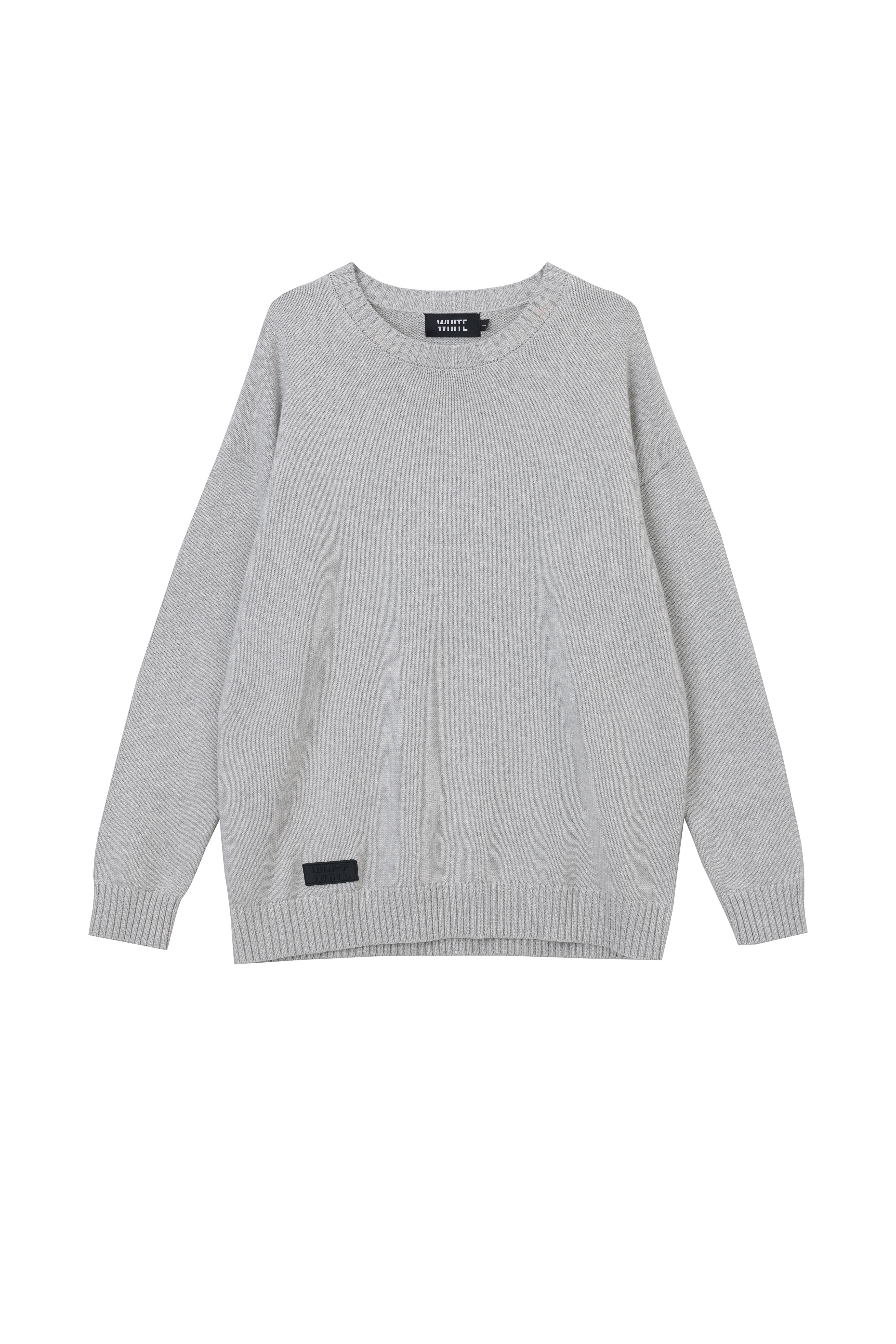 White London Clothing light grey oversized merino wool blend sweater with textured boucle yarn and embossed logo tag.