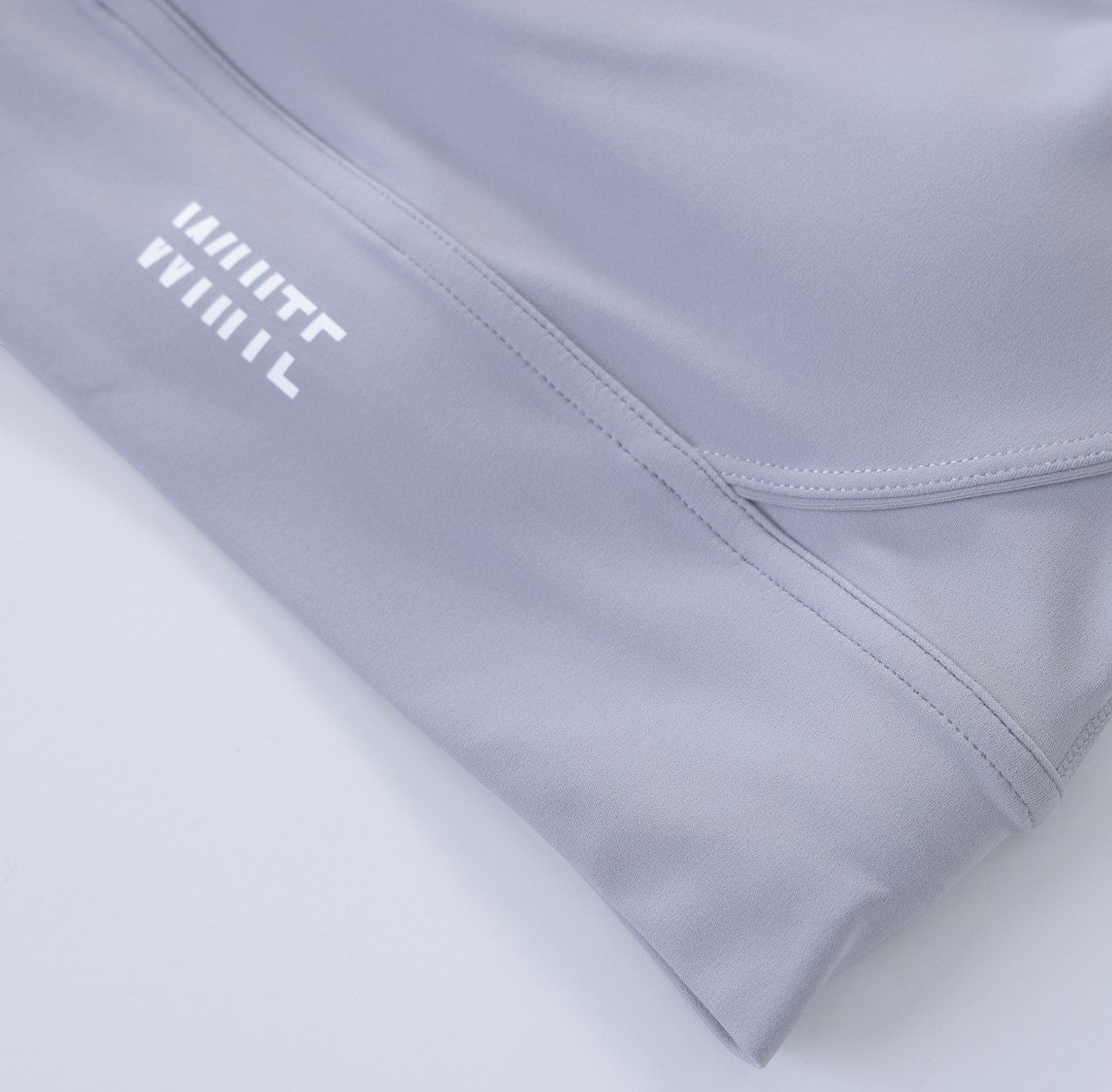 White London Clothing light grey sculpt sports bra with spaghetti straps and removable padding.