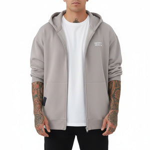 White London Clothing grey zip-up hoodie in 100% jersey with dropped shoulders and WL logo detail.