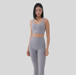 White London Clothing light grey sculpt sports bra with spaghetti straps and removable padding, perfect for yoga.