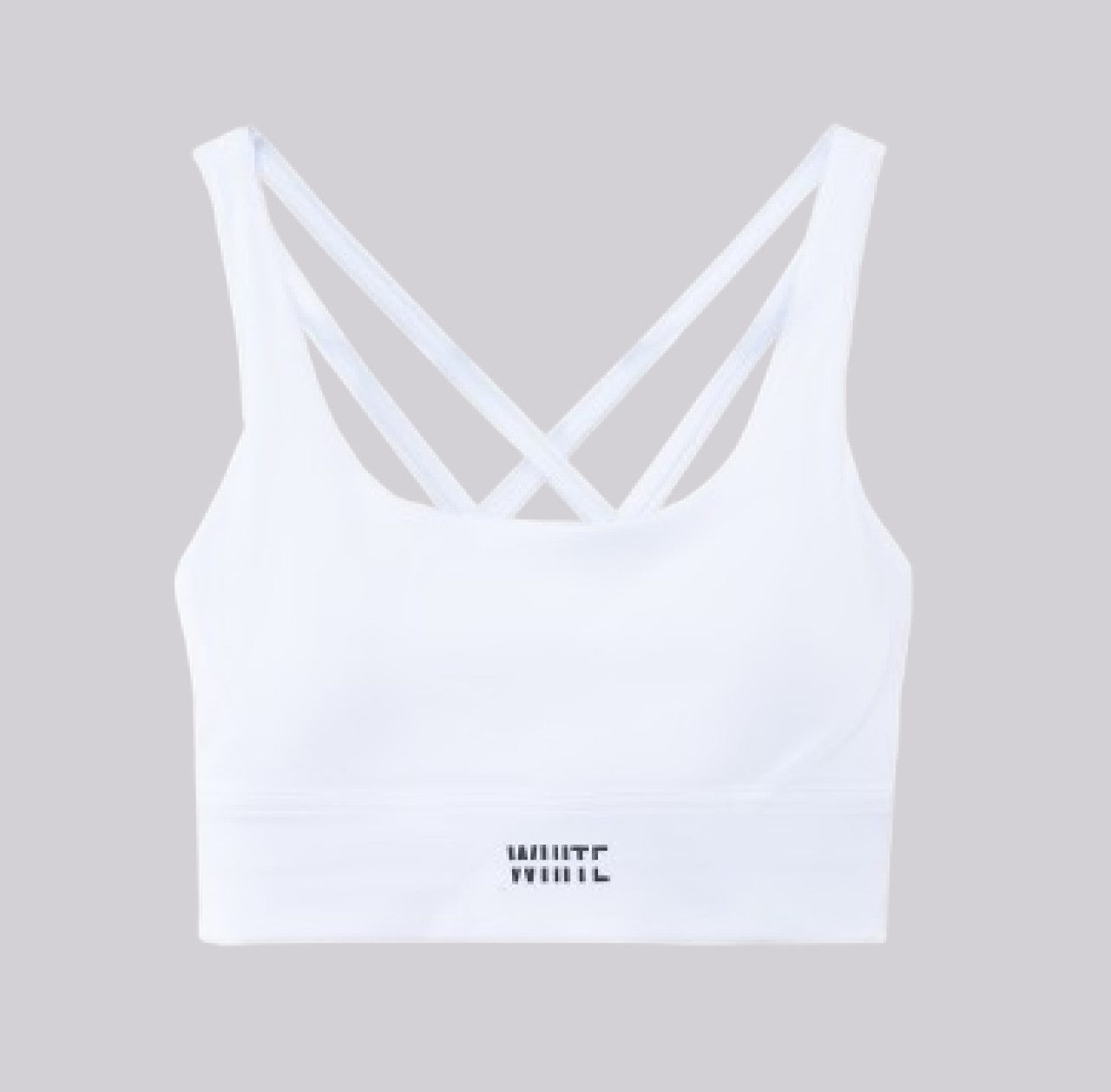 White London Clothing white sculpt sports bra with criss-cross spaghetti straps and removable padding.