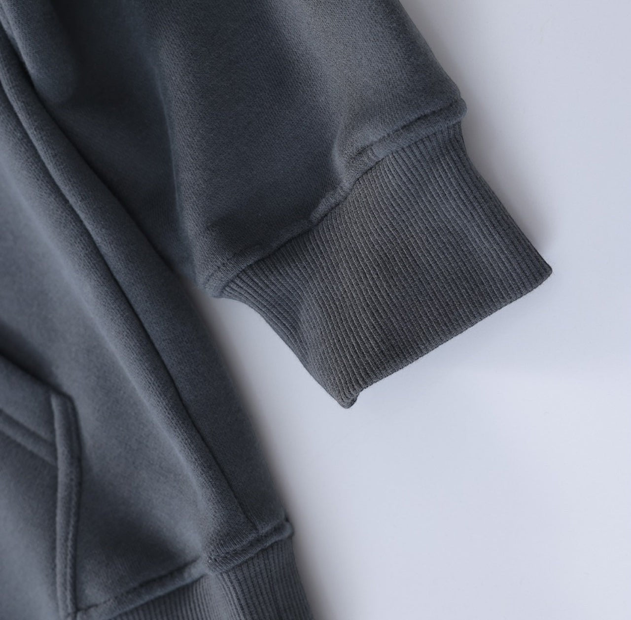 White London Clothing charcoal grey 100% cotton signature hoodie with ribbed cuffs and pocket detail.