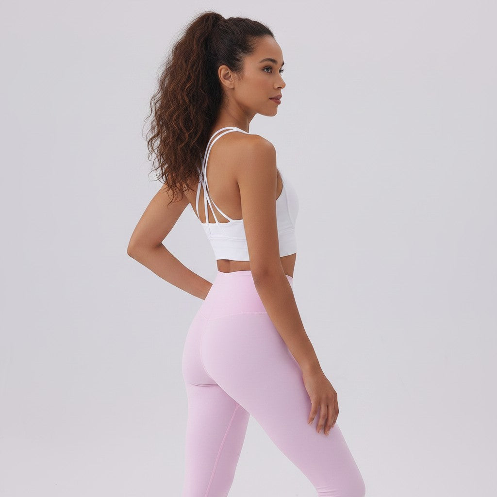 White London Clothing light pink high-waisted sculpt leggings worn by a woman for yoga or gym.