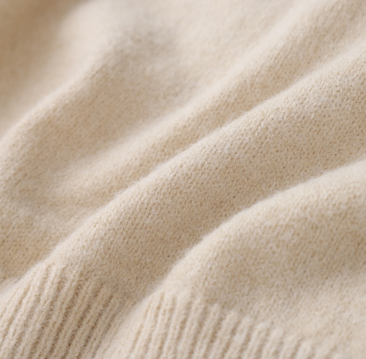 White London Clothing taupe knitted sweater made from premium yarn, featuring a soft touch and timeless silhouette.