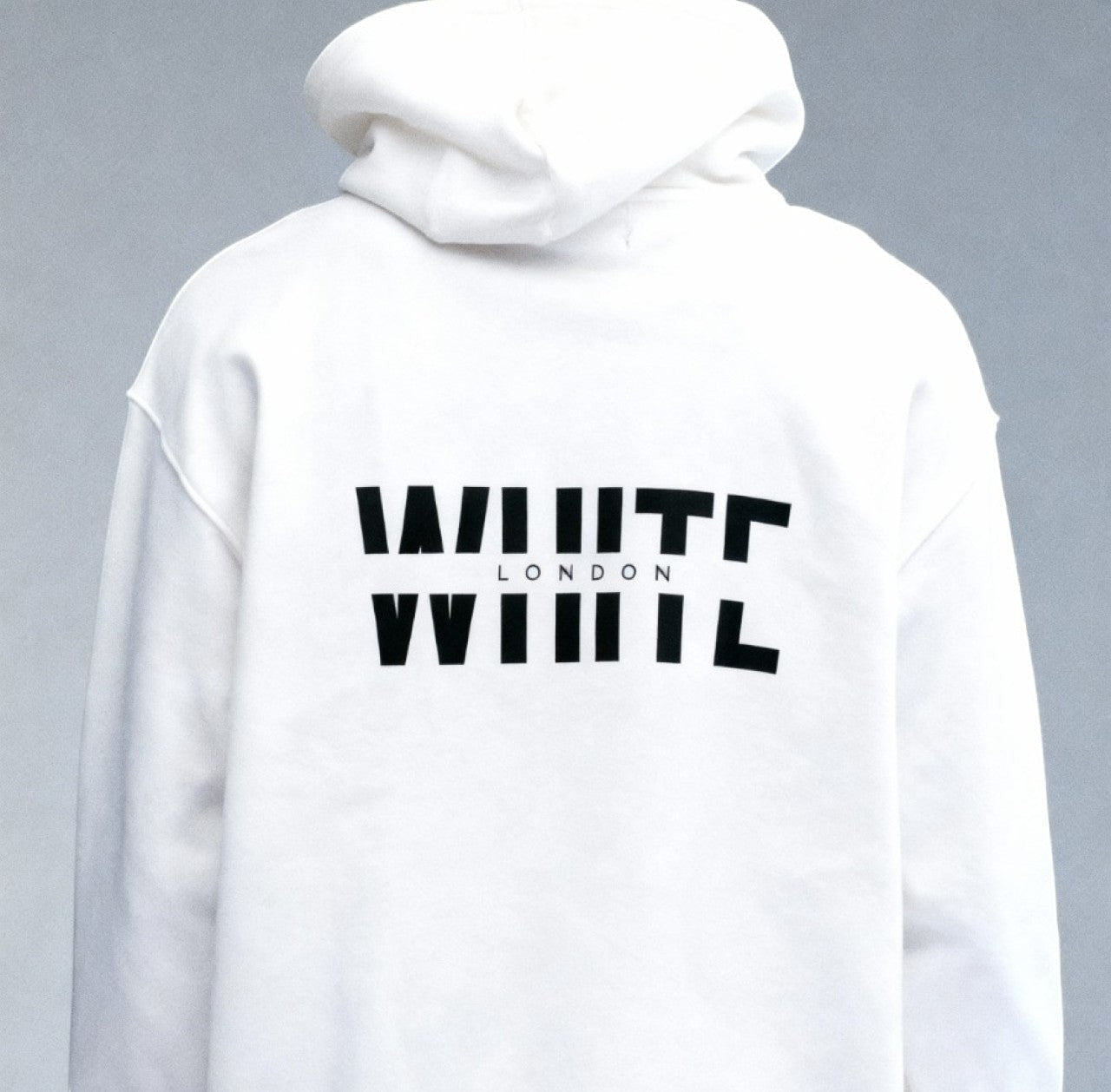 White London Clothing white 100% cotton hoodie with large black graphic logo on back and chest. Double lined hood.